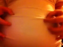 Belly play in white camisol