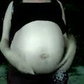 Exposed pregnant belly