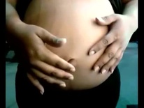 Pregnant belly with an interesting belly button
