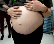 Copy of Pregnant belly in a Rite Aid store