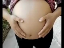 Pregnant belly outside.mov