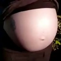 Pregnant belly about to pop