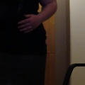 Sexy tight black clothes and jiggly belly