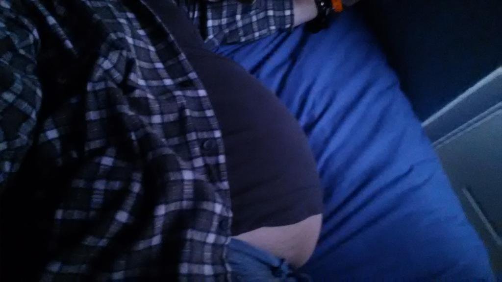 My shirt won't even cover my belly anymore.jpg